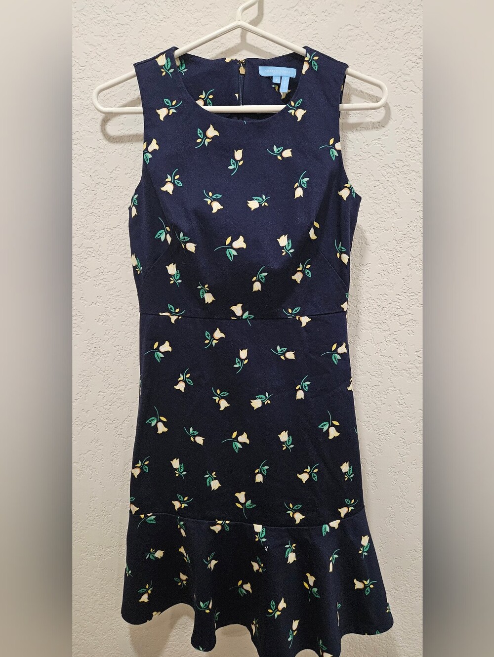 Navy Floral Sleeveless Dress With Ruffle Bottom